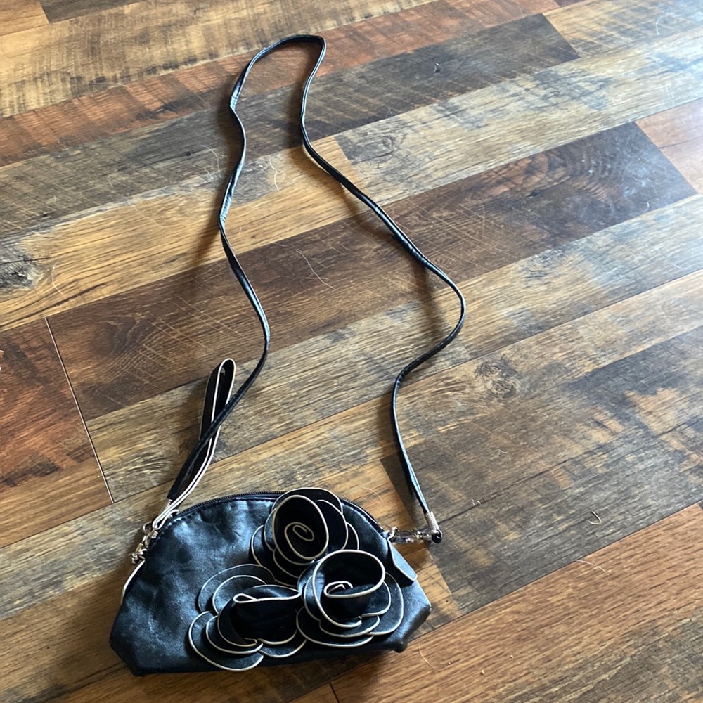 Akua small crossbody bag with floral detail